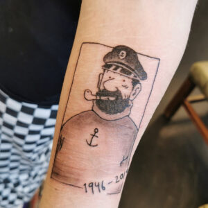 Kapten Haddock tatuerad på underarm.