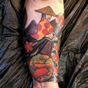 Samurai tatuerad på underarm.